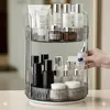 A two-tiered rotating organizer filled with various skincare and makeup products. Anteprima dell’immagine prodotto