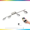 A modern track light fixture with four adjustable spotlights, shown with a smartphone controlling its features. Produktbild-Vorschau