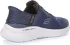 A side view of a blue Skechers slip-on sneaker with a white sole. Náhľad obrázku produktu