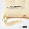 A close-up of a cream-colored cushion with text overlay and a logo. Anteprima dell’immagine prodotto