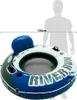 A person is standing behind an inflatable river tube, indicating its size. Anteprima dell’immagine prodotto