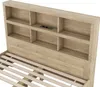A close-up view of a wooden headboard with built-in shelves and a USB charging port. Produktbild-Vorschau