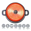 The bottom of a black pot is shown, with the heating element glowing red and orange. Below the pot are several circular icons representing different stove types and dishwasher safety. Produktbild-Vorschau