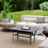 A patio scene with outdoor furniture and plants. Náhled obrázku produktu