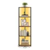 A corner shelf unit with books, picture frames, and a plant. Produktbild-Vorschau