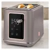A modern digital toaster with a taupe finish and rose gold accents. Podgląd zdjęcia produktu