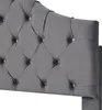 A close-up view of a tufted gray velvet headboard. Produktbild-Vorschau