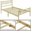 A gold metal bed frame with two inset images showing assembly instructions. Produktbild-Vorschau