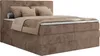 A brown corduroy boxspring bed with pillows and a blanket. Produktbild-Vorschau