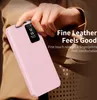 A hand holding a pink phone case with a smart view window. Náhled obrázku produktu