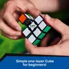 Hands holding a Rubik's Cube with a green background and a blue overlay at the bottom with text. Produktbild-Vorschau