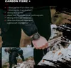 A person wearing a watch is holding a rope while hiking, with another person hiking in the background. Produktbild-Vorschau