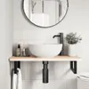A bathroom sink area with a wooden shelf and black metal brackets. Anteprima dell’immagine prodotto