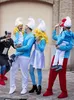 A group of people dressed as Smurfs posing for a photo. Produktbild-Vorschau