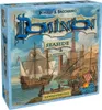 The image shows the box art for the Dominion: Seaside board game expansion, featuring a harbor scene with sailing ships and buildings. Náhľad obrázku produktu