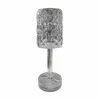 A clear, professional studio shot of a crystal-like table lamp on a white background. Produktbild-Vorschau