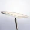 A close-up shot of a modern LED floor lamp with a rectangular light panel. Anteprima dell’immagine prodotto