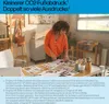 A woman is looking at printed materials on a table in a well-lit room. Voir les images du produit