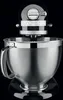A close-up studio shot of a black KitchenAid stand mixer against a black background. Anteprima dell’immagine prodotto
