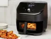 A black Instant Pot Vortex Plus air fryer is on a countertop, with cooked chicken wings in front of it and more chicken wings inside the air fryer. Náhled obrázku produktu