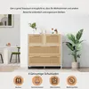 A white and natural wood dresser with cane detailing, displayed in a room setting with a plant and a table with chairs in the background. Text overlays describe storage space and drawer capacity. Produktbild-Vorschau