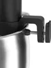 A close-up of a black clamp attached to a silver bowl. Náhľad obrázku produktu