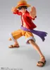 A full-body shot of a Monkey D. Luffy action figure in a dynamic pose against a light gray background. Podgląd zdjęcia produktu