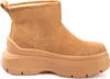 A single brown boot with a thick platform sole is shown against a white background.
