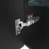 A close-up view of a cabinet hinge and a glass shelf inside a black cabinet. Produktbild-Vorschau