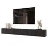 A modern, wall-mounted TV stand with a television and decorative items on a white background. Voir les images du produit