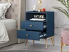 A blue nightstand with gold legs next to a bed. Podgląd zdjęcia produktu