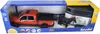 A toy truck and trailer set in its packaging. Produktbild-Vorschau