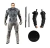 A toy action figure with accessories laid out on a white background. Anteprima dell’immagine prodotto