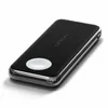 A black Satechi Quatro Wireless Power Bank with a silver trim and a white charging pad is shown on a white background. Produktbild-Vorschau