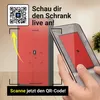 A smartphone is being used to scan a QR code in front of a red cabinet, suggesting an augmented reality experience. Produktbild-Vorschau