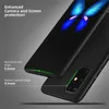 A close-up marketing image showing two black phone cases, highlighting their protective features. Voir les images du produit