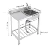 A stainless steel commercial kitchen sink with a faucet and shelf, shown with dimensions indicated by text overlays. Produktbild-Vorschau