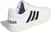 A white Adidas sneaker with black stripes is shown from the side and back. Anteprima dell’immagine prodotto
