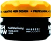 A close-up studio shot of a hair styling product jar. Náhled obrázku produktu