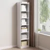 A tall, white, narrow bookshelf filled with various boxes and books, placed next to a window with curtains. Podgląd zdjęcia produktu