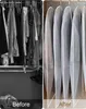 A split image showing a messy closet on the left and an organized closet with garment bags on the right. The text "Before" is on the left and "After" is on the right. Produktbild-Vorschau
