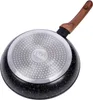 The underside of a frying pan with a wooden handle. Náhled obrázku produktu