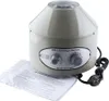 A laboratory centrifuge with its instruction manual and power cord. Produktbild-Vorschau