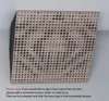 A corner acoustic bass trap panel with a perforated wood surface and a dark backing, shown mounted on a wall. Náhľad obrázku produktu