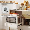 A close-up view of a pull-out shelf in a kitchen cabinet, showcasing a microwave and a bowl of fruit. Podgląd zdjęcia produktu