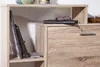 Close-up of a wooden shoe cabinet with books and glasses on top. Produktbild-Vorschau