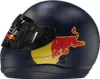 A close-up side view of a dark blue helmet with Red Bull branding. Voir les images du produit