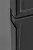 A close-up of the corner of a dark gray cabinet, showing the seam between two doors and a handle. Náhled obrázku produktu