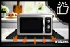 A microwave oven is placed on a black mat on a kitchen counter. Orange arrows indicate heat dissipation from the mat. Náhled obrázku produktu