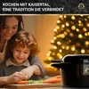 A mother and child are preparing food in a kitchen with a Christmas tree in the background. Produktbild-Vorschau